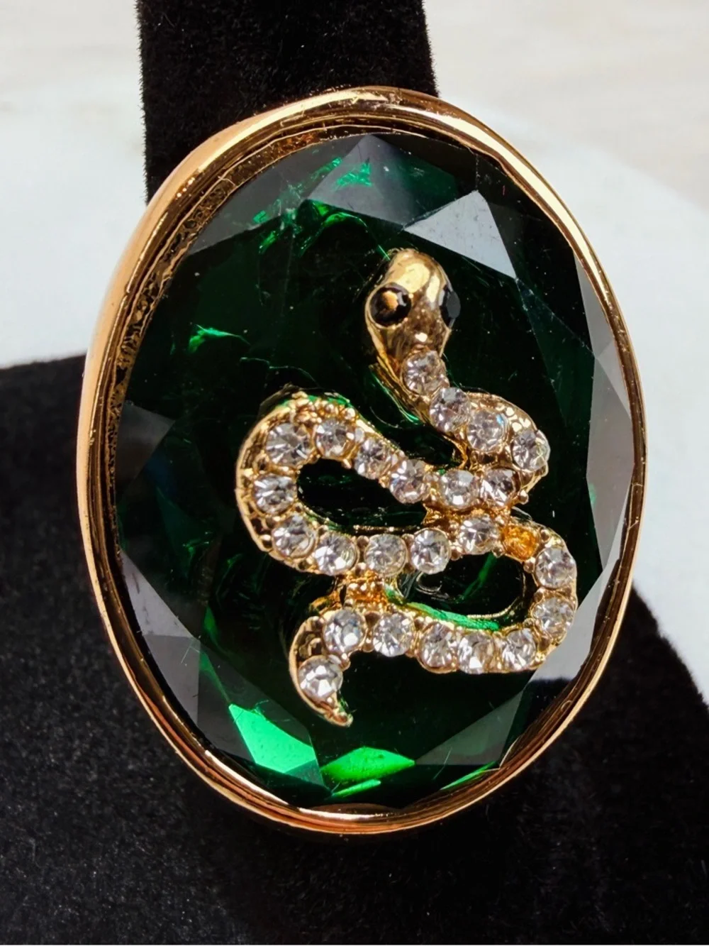 Beautiful, goldtone, emerald green bling snake statement ring